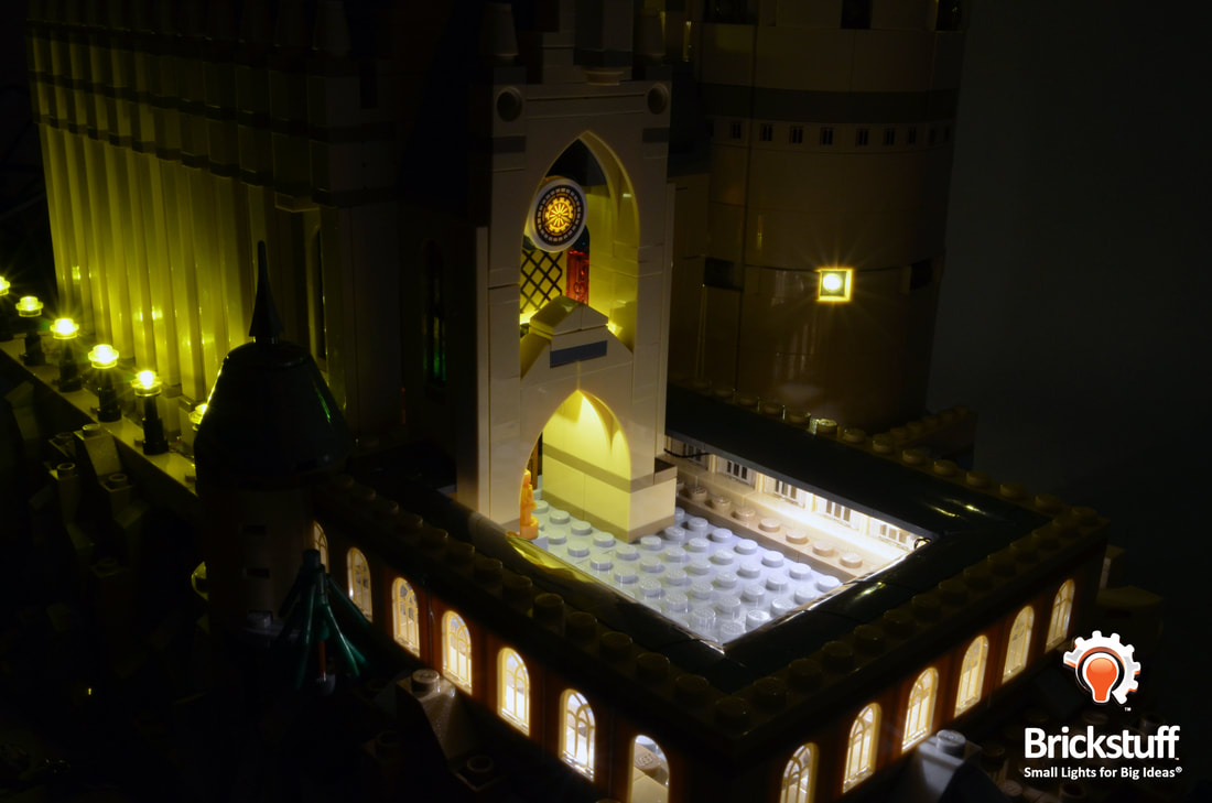 Photo of LEGO Hogwarts Castle outer courtyard with the Brickstuff light and sound kit installed.