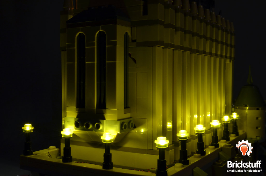 Photo of LEGO Hogwarts Castle exterior lamp posts with the Brickstuff light and sound kit installed.