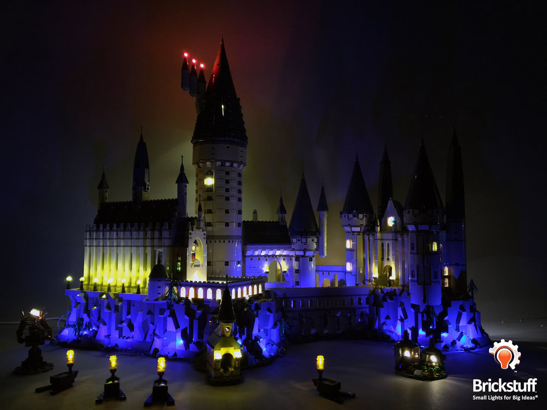 Photo of LEGO Hogwarts Castle main exterior front with the Brickstuff light and sound kit installed.